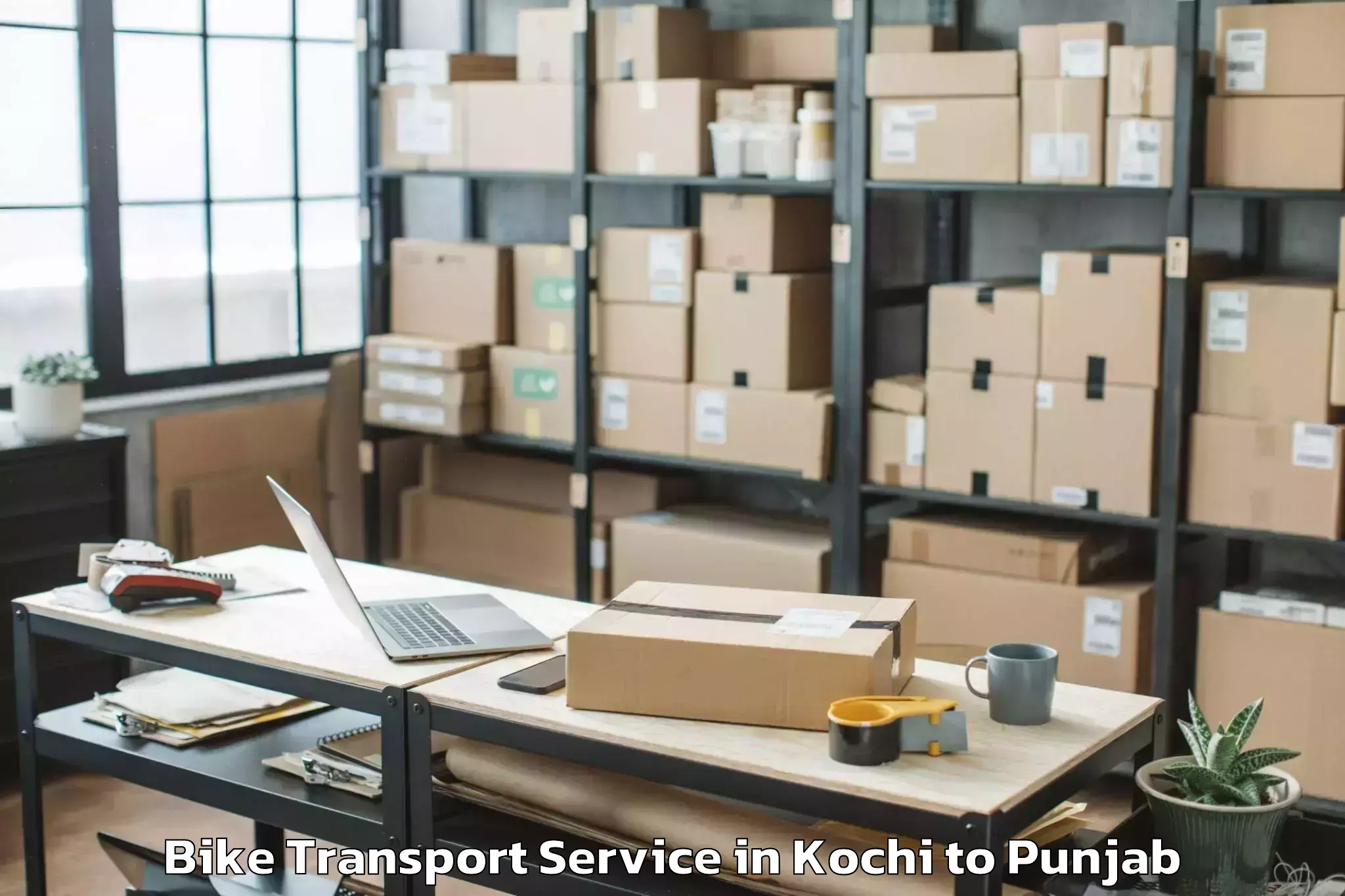 Efficient Kochi to Adampur Bike Transport